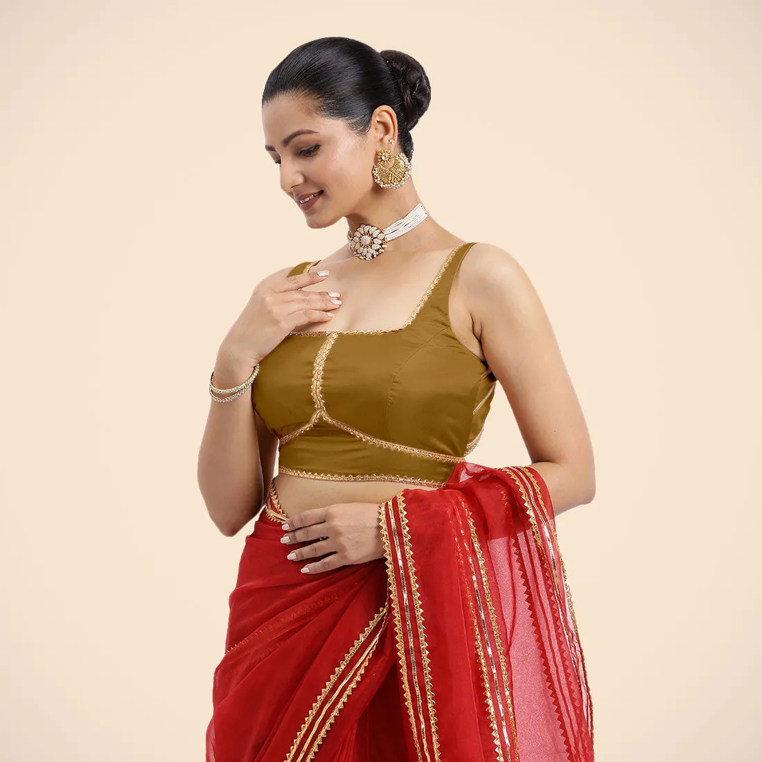 Arya x Tyohaar | Bronze Gold Sleeveless FlexiFit™ Saree Blouse with Square Neck and Back Window Embeliished with Golden Gota and Pearl Lace