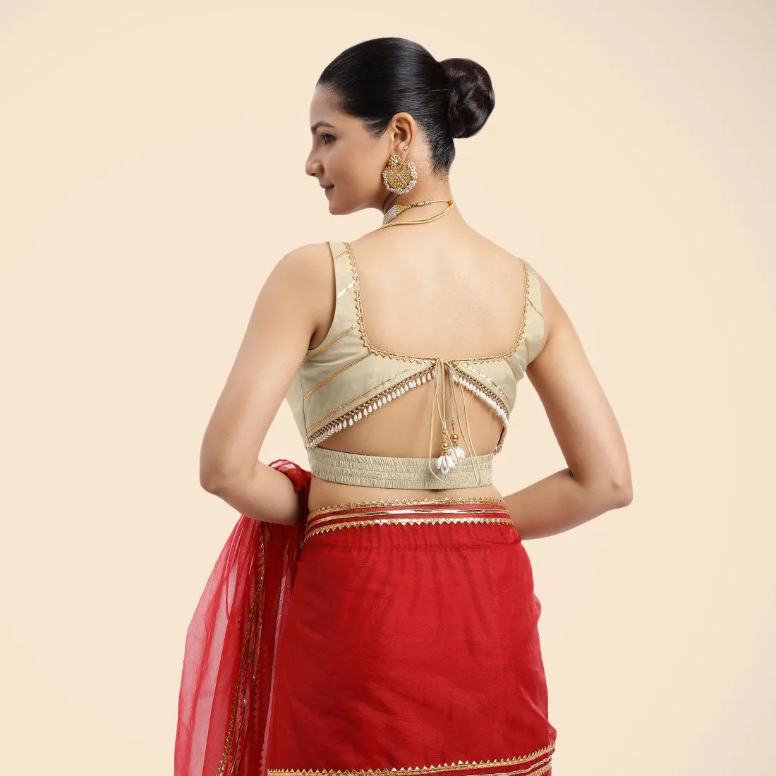 Arya x Tyohaar | Cream Sleeveless FlexiFit™ Saree Blouse with Square Neck and Back Window Embeliished with Golden Gota and Pearl Lace