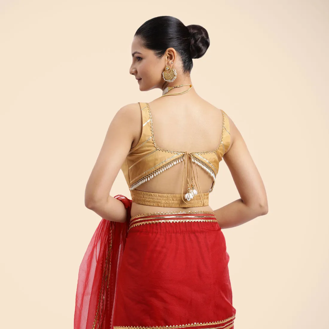 Arya x Tyohaar | Gold Sleeveless FlexiFit™ Saree Blouse with Square Neck and Back Window Embeliished with Golden Gota and Pearl Lace