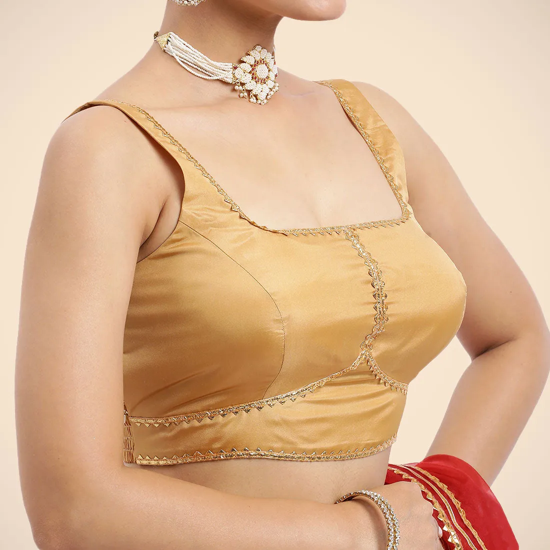 Arya x Tyohaar | Gold Sleeveless FlexiFit™ Saree Blouse with Square Neck and Back Window Embeliished with Golden Gota and Pearl Lace