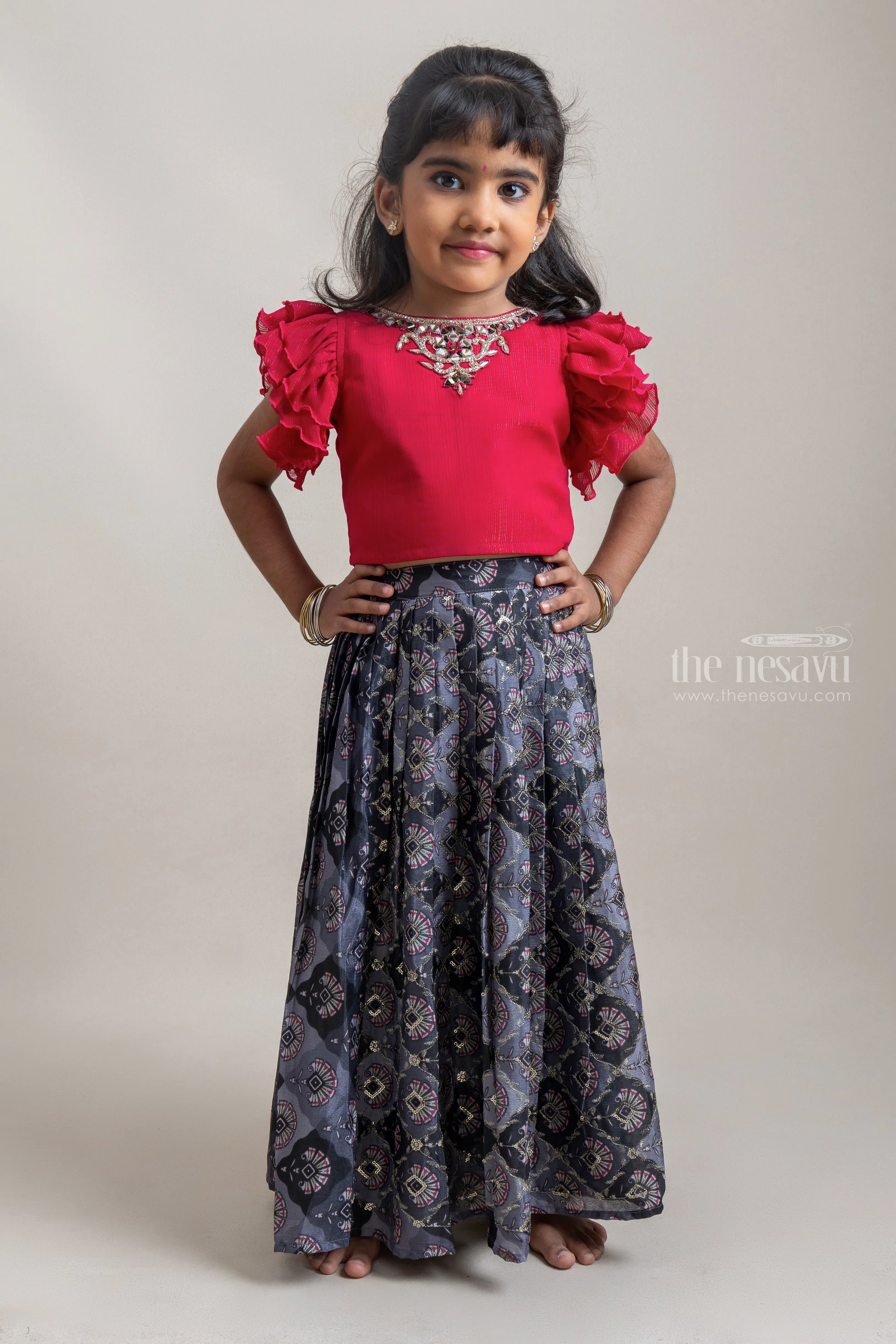 Beautiful Neckless Embroidered Red Ruffled Top And Green Floral Printed Skirt For Girls