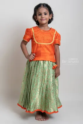 Beautiful Traditional Orange Silk Blouse With Green Pleated Designer Pattu Pavadai