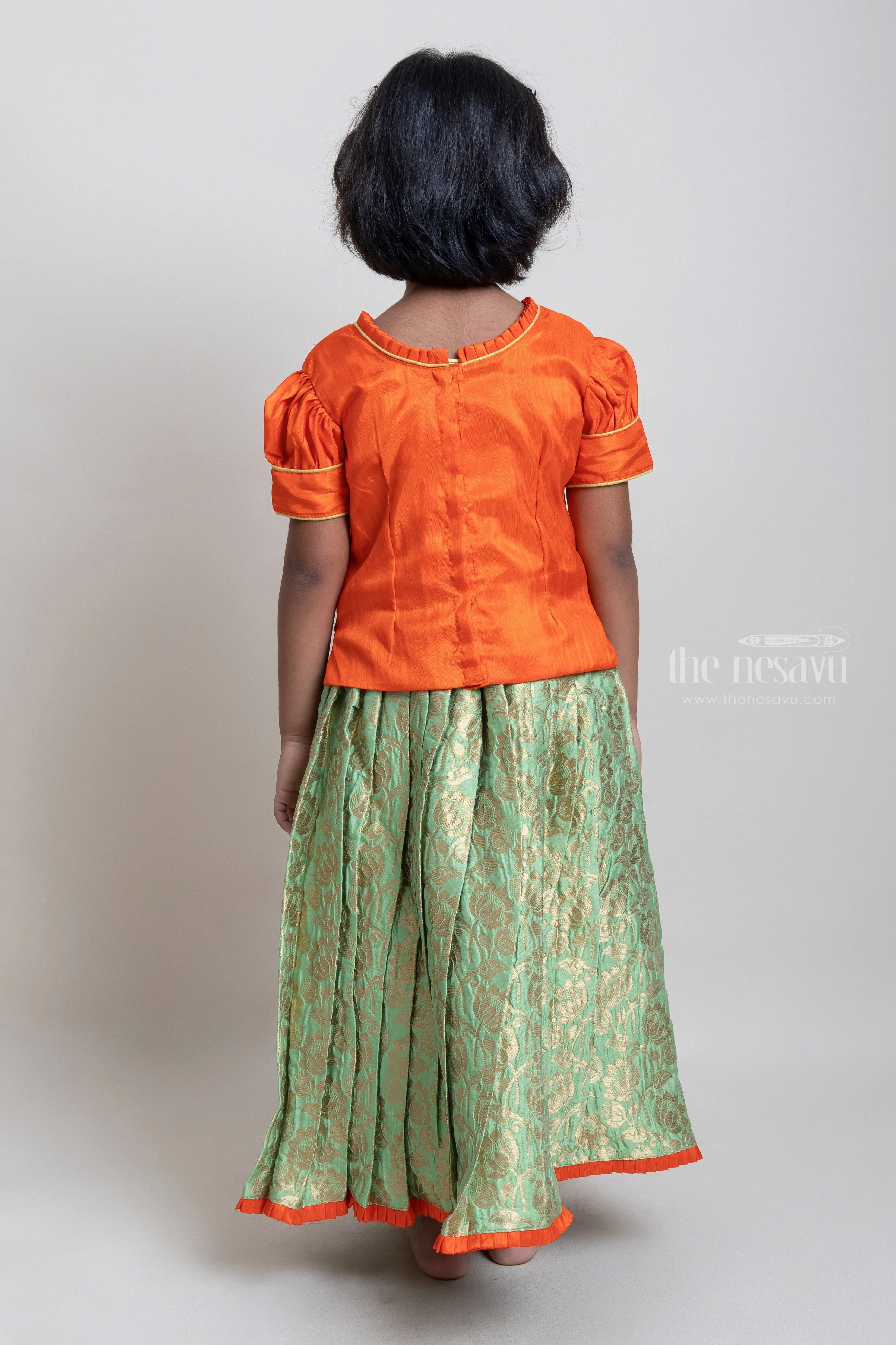 Beautiful Traditional Orange Silk Blouse With Green Pleated Designer Pattu Pavadai