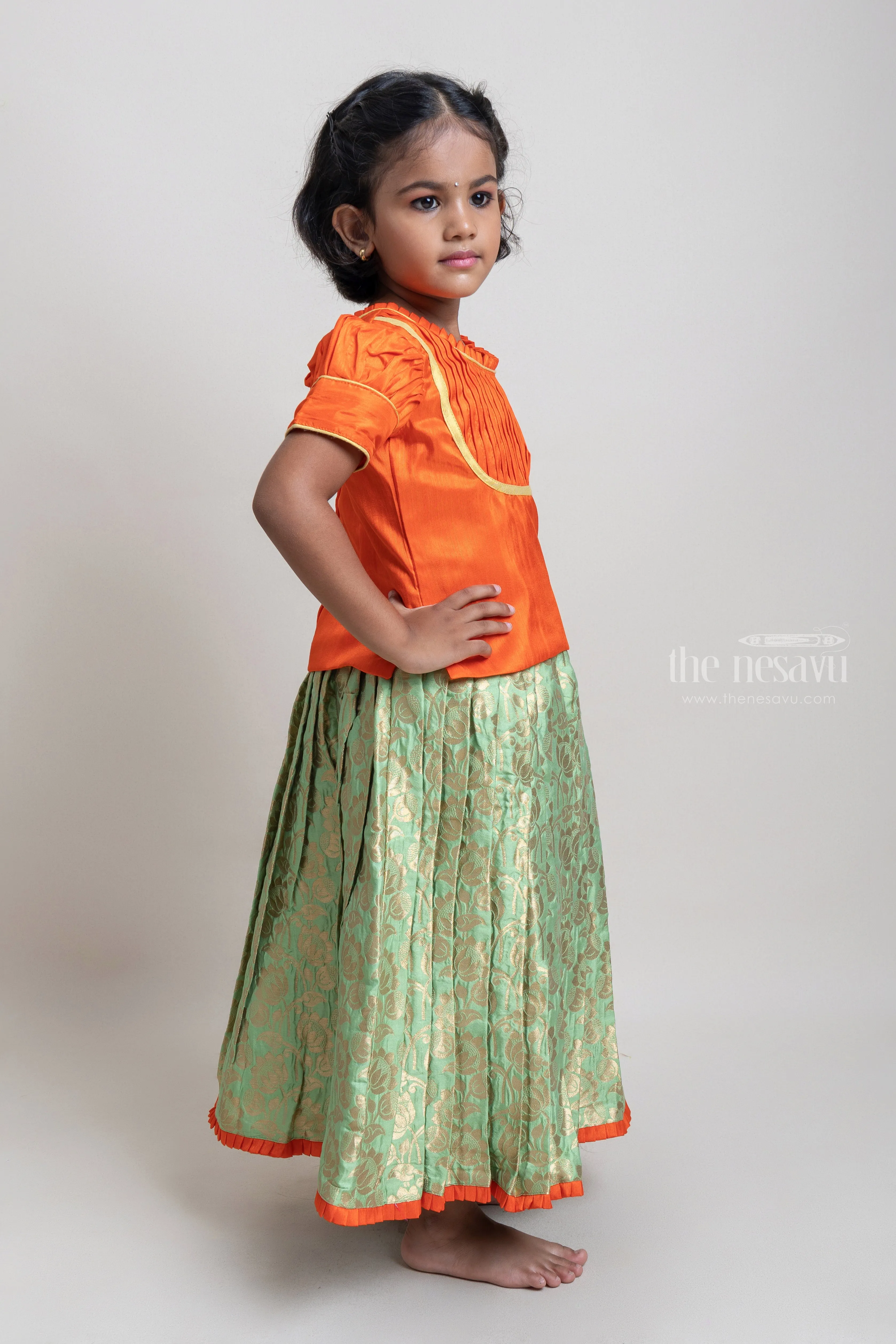 Beautiful Traditional Orange Silk Blouse With Green Pleated Designer Pattu Pavadai