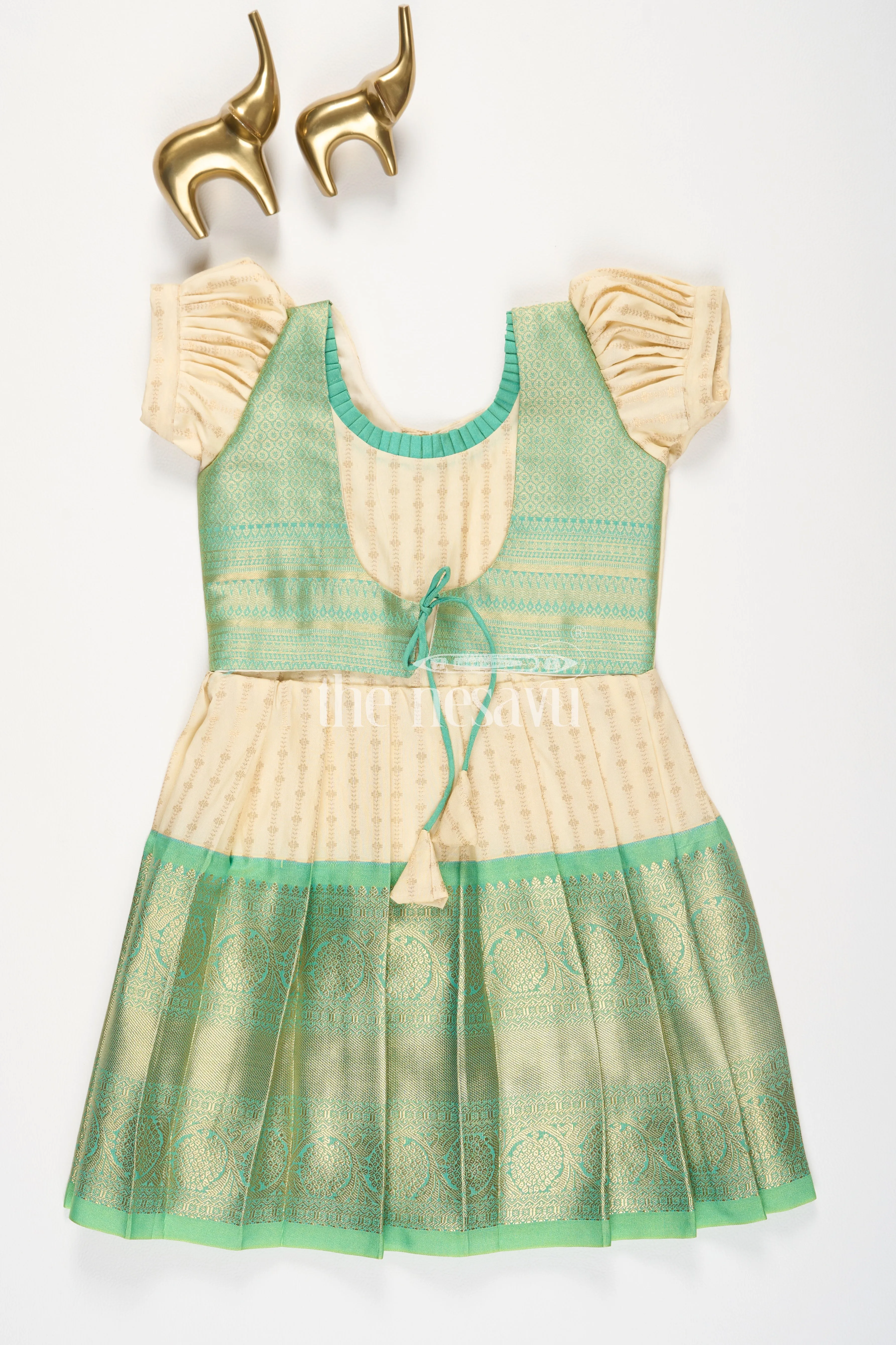 Cream and Green Semi Kanchivaram Silk Frock with Golden Stripes and Brocade Border for Girls