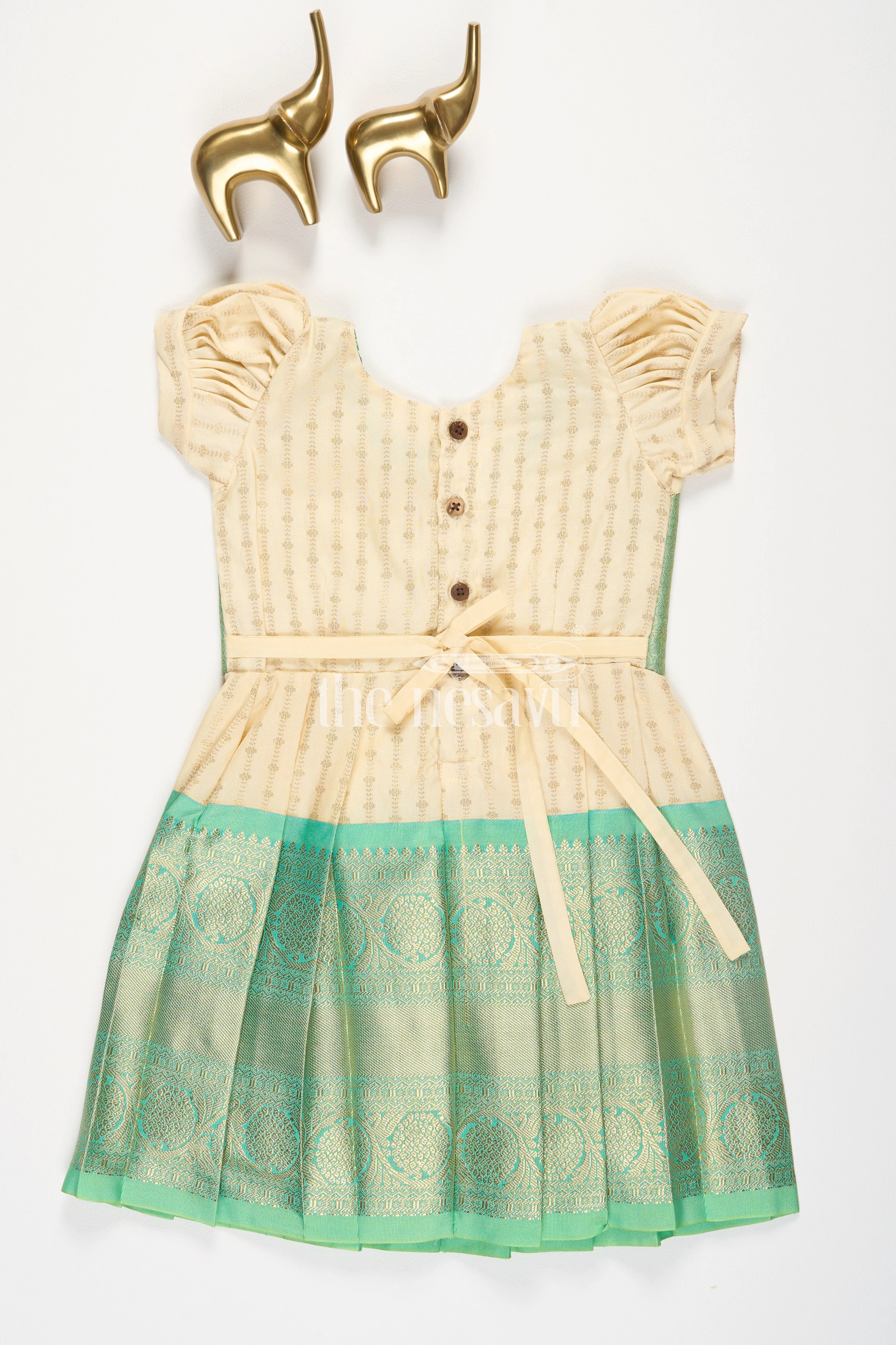 Cream and Green Semi Kanchivaram Silk Frock with Golden Stripes and Brocade Border for Girls