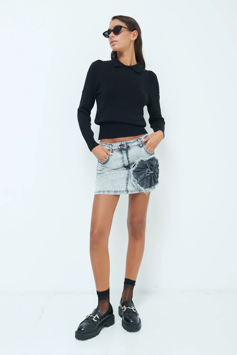 Distressed denim mini skirt with patch detail wholesale