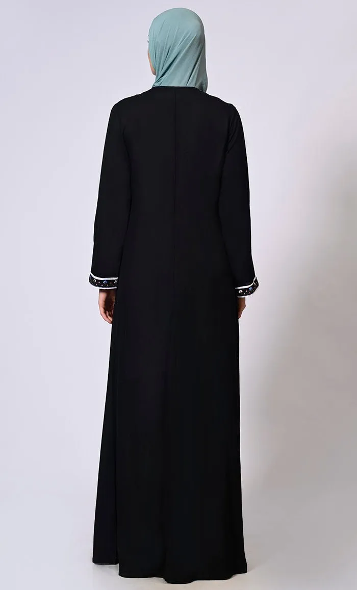 Feminine Flourish: Embroidered Front Zip Black Abaya with Front Pockets