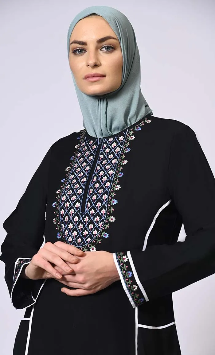 Feminine Flourish: Embroidered Front Zip Black Abaya with Front Pockets